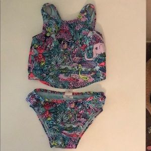 Two-piece, multi-color.  Animal/floral print.